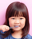 Young patient brushing teeth after children's dentistry visit