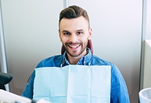 Male patient smiling during his preventive appointment