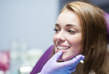 a patient receiving her same-day dental crown in Crookston 