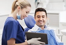 Dentist discussing dental implant technology in Crookston (Intro Paragraph IMAGE)