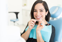 a dental patient seated in a treatment chair