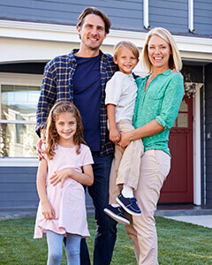 Family smiling after visiting their dentist in Crookston Minnesota