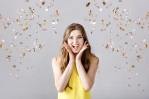 woman smiling confetti